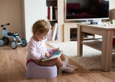 graphicstock cute little baby girl at home sitting on potty playing with tablet SOlzYt UG Onsite Consultations